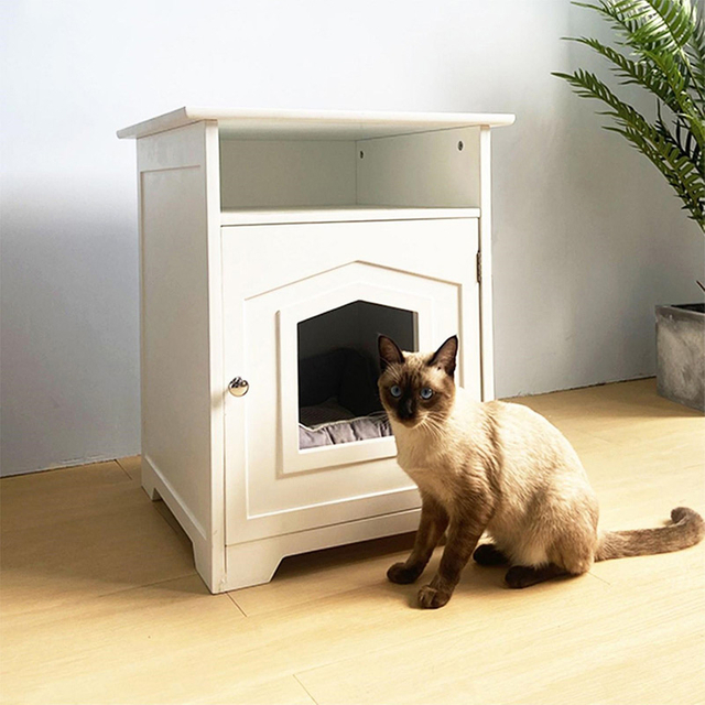 Maison de meubles à litière de chat ci-joint avec porte